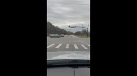 Wrong-Way Driver Slowly Reverses Away From Intersection