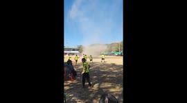 Pitch spin-vader! Whirlwind rips through football game as players flee