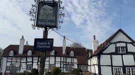 Landlord wins battle to keep bull mural on pub if he makes boozer look like a farm