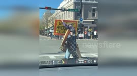 US: Gainesville Protesters Rally Against Trump and Musk on Presidents’ Day