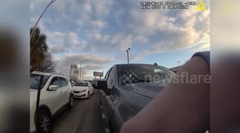 US: Burglary Suspect Rams Car and Runs Over Officer as Police Open Fire