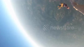 Skydiver faces close call during high-speed near collision in UK
