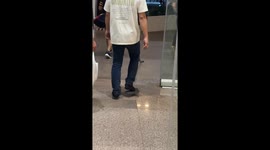 Friendly Cat Greets Mall Patrons at the Door