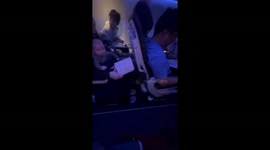 Passenger uses tablet to cheer up crying baby on US flight
