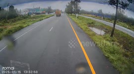 Pickup truck spins out-of-control on wet highway into grass median