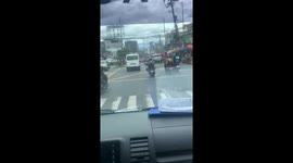 Hero motorcycle rider breaks up traffic congestion to allow ambulance through