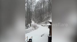 Snow seen in North Carolina as extreme weather grips large swathes of the US