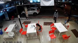 Brave woman chases after robber with a chair in laundry shop
