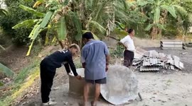 Rescue team rappel into 30ft deep well to save stranded cobra