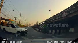 Bungling truck driver crashes into low bridge