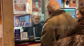 Elderly people buy tickets before watching a film at Cinema delle Provincie, a small, single-screen community arthouse cinema in Rome.