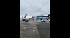 Two Planes Tap At Seattle Airport