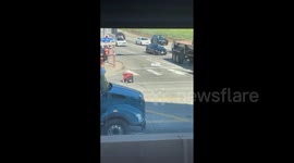 Delivery Robot Attempts To Cross Busy Intersection