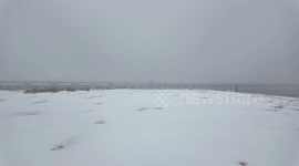 US: Snow-Covered Beach Scene Captured In Norfolk, Virginia 2