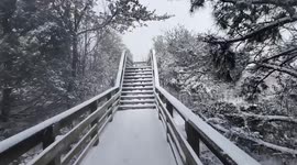 US: Snow-Covered Beach Scene Captured In Norfolk, Virginia