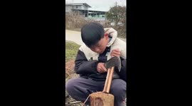 Chinese student crafts miniature stilted house with waste wood
