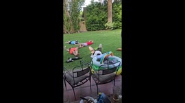 Dog Enjoys Siesta With Owners
