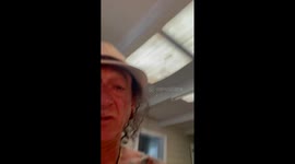 Seemingly unbothered man shows us that his fire extinguisher is in fact, on fire