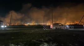 Kenya airport staff control fire in grassland