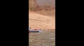 Family flee fire on floating home on river in northern Thailand