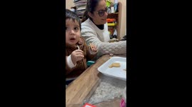Baby's Chuckle Makes Family Erupt In Laughter