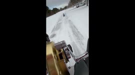 Woman Goes Sledding With Boogie Board And Fishing Pole