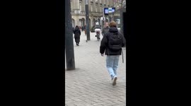 Cyclist Falls In Amsterdam Plaza