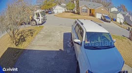 Garbage Truck Throws Away Trash Bin