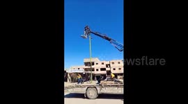 Syria: Installation of solar-powered lighting fixtures on Agricultural Bank Street in Al-Mayadeen city, east of Deir Ezzor