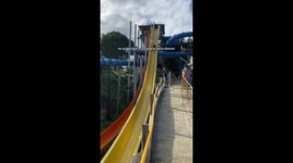Woman Falls Flat At Waterslide Exit