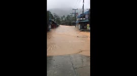 Muddy torrents surge through streets on Thai Full Moon Party island