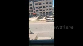 Israeli forces storm a residential building in the city of Nablus
