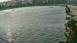 Female angler screams as 30lbs fish drags her into lake