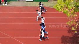 Boy loses both shoes and still wins 100m sprint barefoot at school in China
