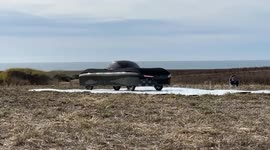 Flying car soars over traffic in 'world first'