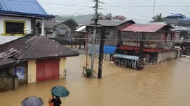 Flooding in Jipapad, Eastern Samar, Philippines, as heavy rains persist