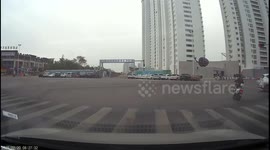 Motorcyclist slips and falls twice in Guangxi, China