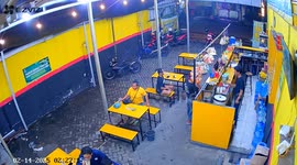 Woman loses balance and falls from chair in Surabaya, Indonesia