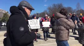Protesters rally against Trump and Musk in Washington DC, USA