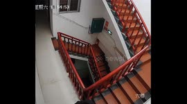 Person slips on stairs while using phone, Guangxi, China
