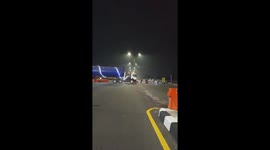 Extra-long vehicle navigates turn in Klaten, Indonesia