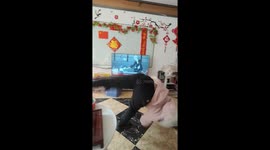 Woman accidentally hits table during tumbling in Hubei, China