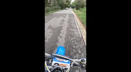 Motorcycle rider collides with car in Italy