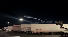 SpaceX Falcon 9 launch lights up night sky in Primm, Nevada, USA