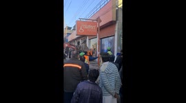 Backhoe accidentally taps pole and lightly injures worker in Sheikhupura, Pakistan