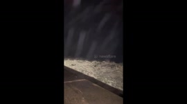 Man gets soaked by sudden wave while waiting in San Sebastian, Spain