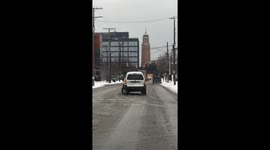 Car drives with broken axle and sideways wheel in Cleveland, Ohio