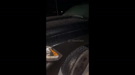Car covered in ice in Northern Indiana due to freezing rain