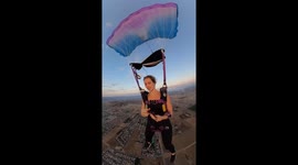 Skydiver applies makeup mid-air in Perris, California, USA