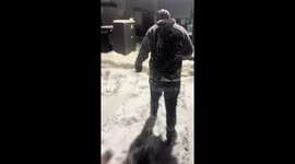 Man startled by a fart slips in the snow in Dayton, Ohio, USA